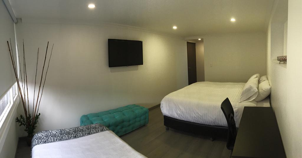 Hotel Metro 26 Богота Номер фото